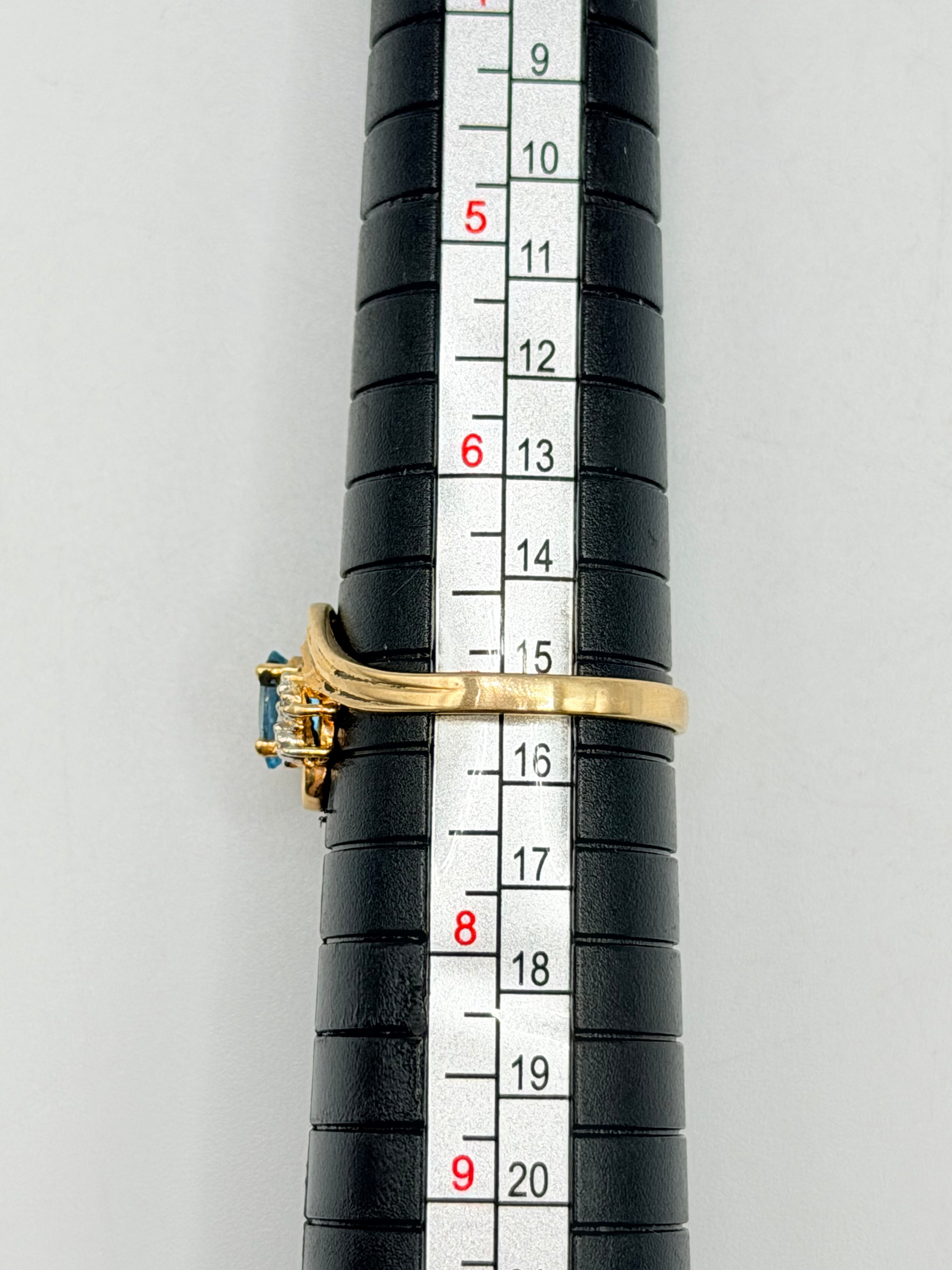 Solid 10K Yellow Gold Ring with Oval Cut Blue Topaz and Diamond Accents Size 7