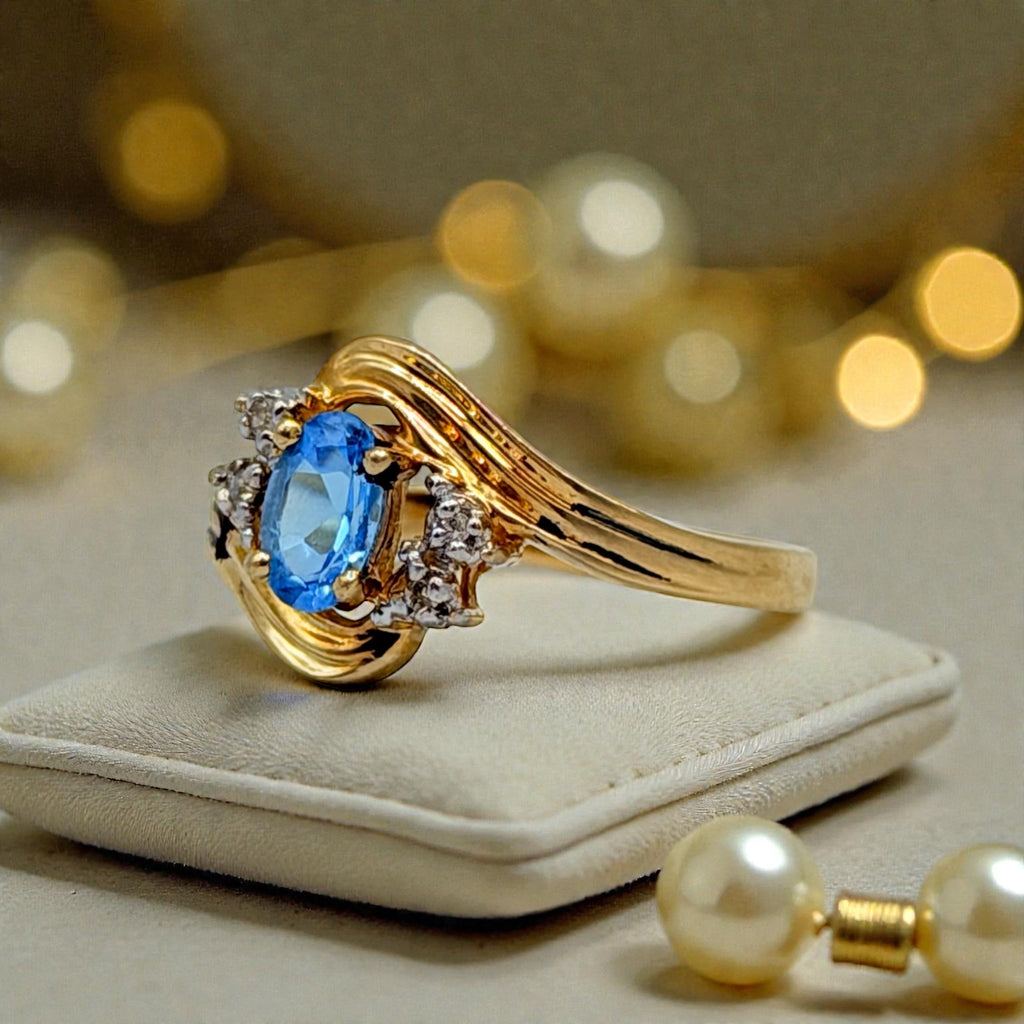 Solid 10K Yellow Gold Ring with Oval Cut Blue Topaz and Diamond Accents Size 7