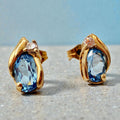Solid 10K Yellow Gold Stud Earrings with Pear Cut Blue Topaz