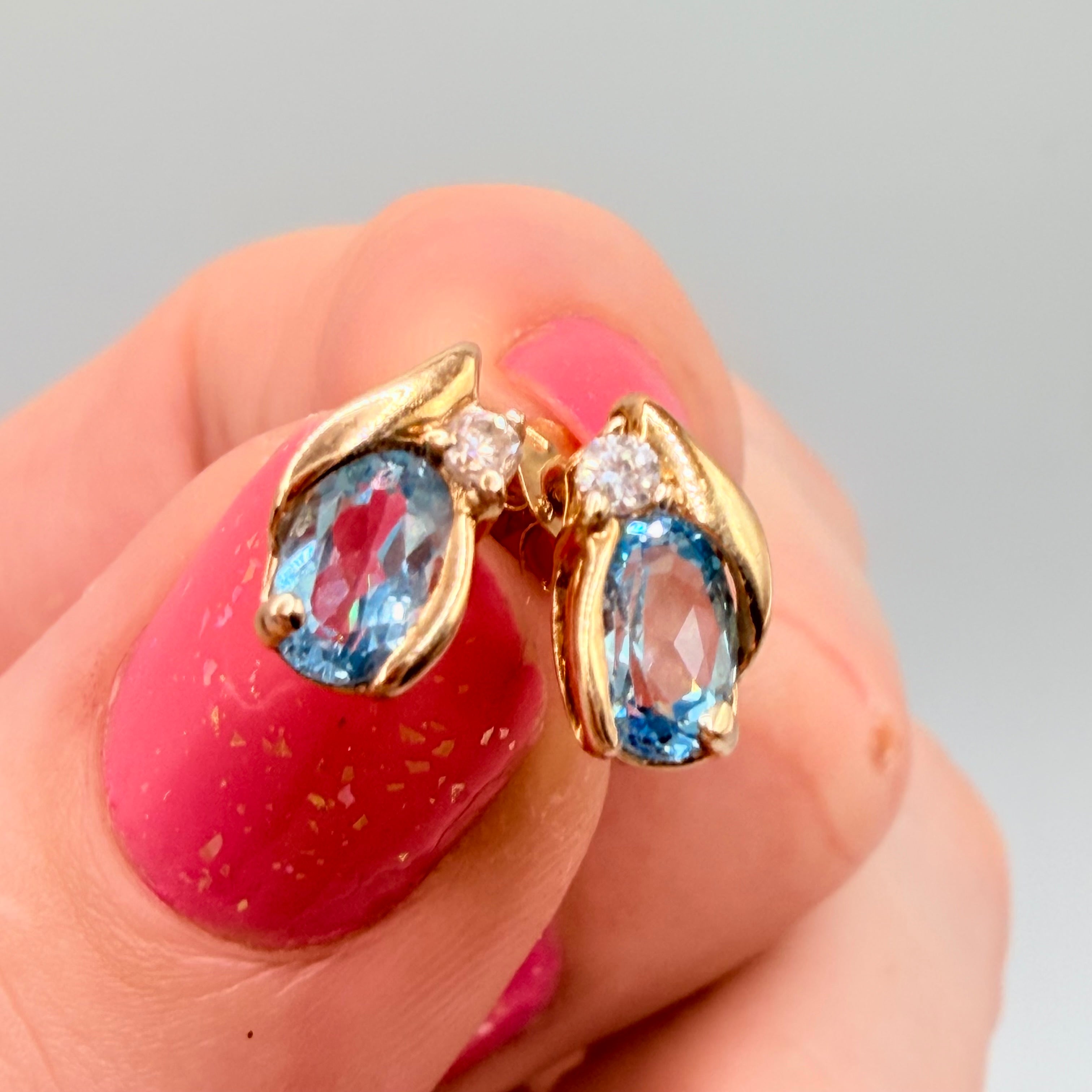 Solid 10K Yellow Gold Stud Earrings with Pear Cut Blue Topaz