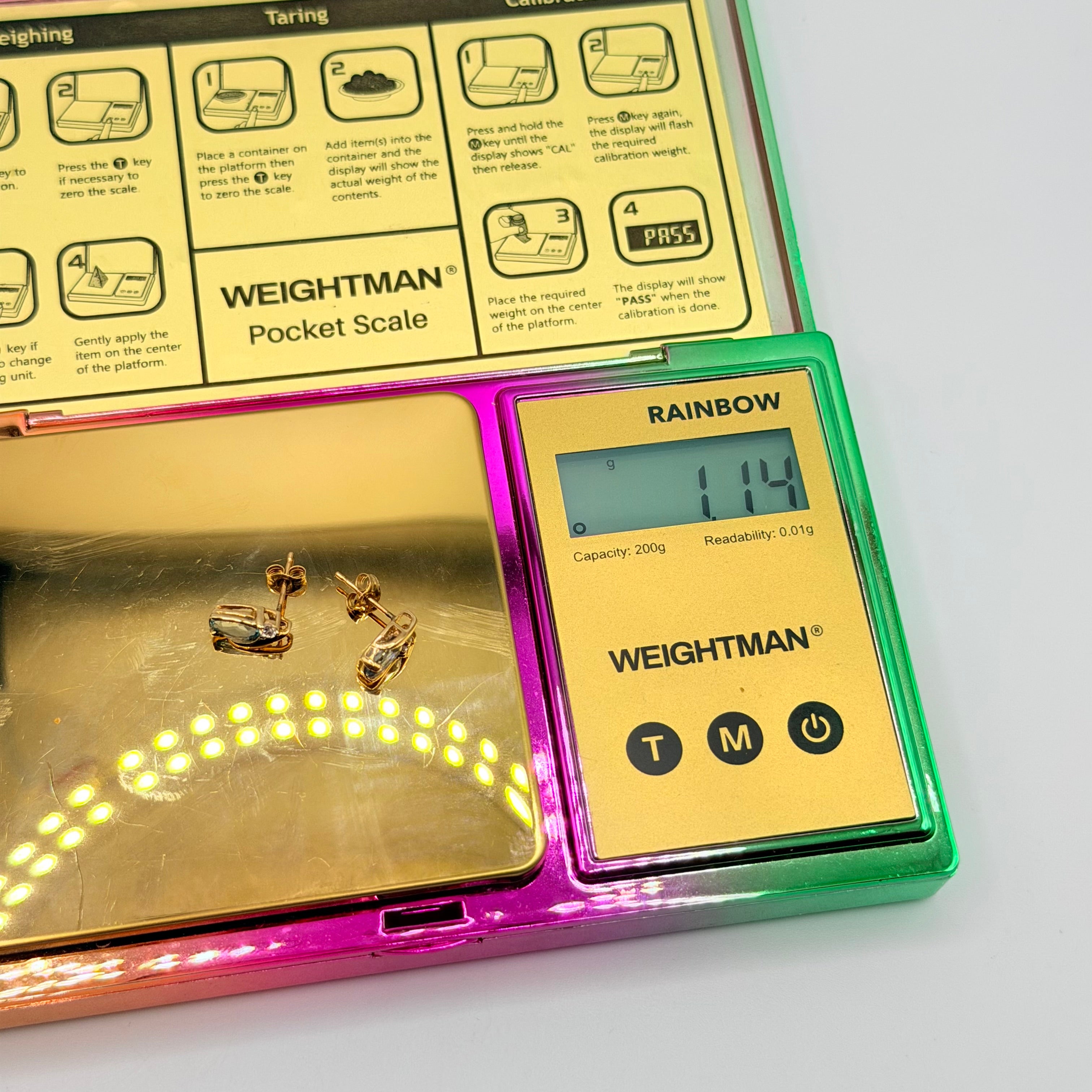 Solid 10K Yellow Gold Stud Earrings with Pear Cut Blue Topaz