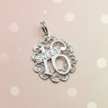 925 sterling silver Sweet 16 charm pendant with filigree scroll openwork border and diamond cut detail