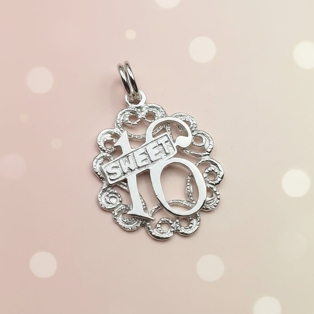 925 sterling silver Sweet 16 charm pendant with filigree scroll openwork border and diamond cut detail