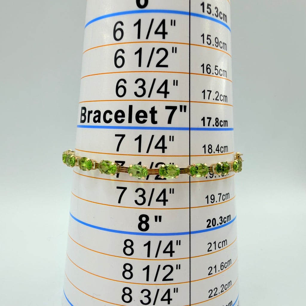 Solid 10K Yellow Gold Bracelet with Oval Cut Lab-Created Peridot 7.5 Inches
