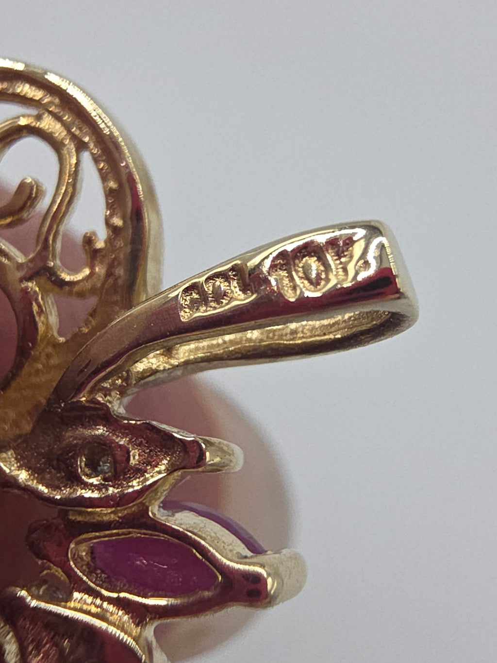 ADL Solid 10K Yellow Gold Open Heart Pendant with Marquise Cut Natural Rubies and Diamonds Along One Side and Openwork Scrollwork Along the Other Makers Mark