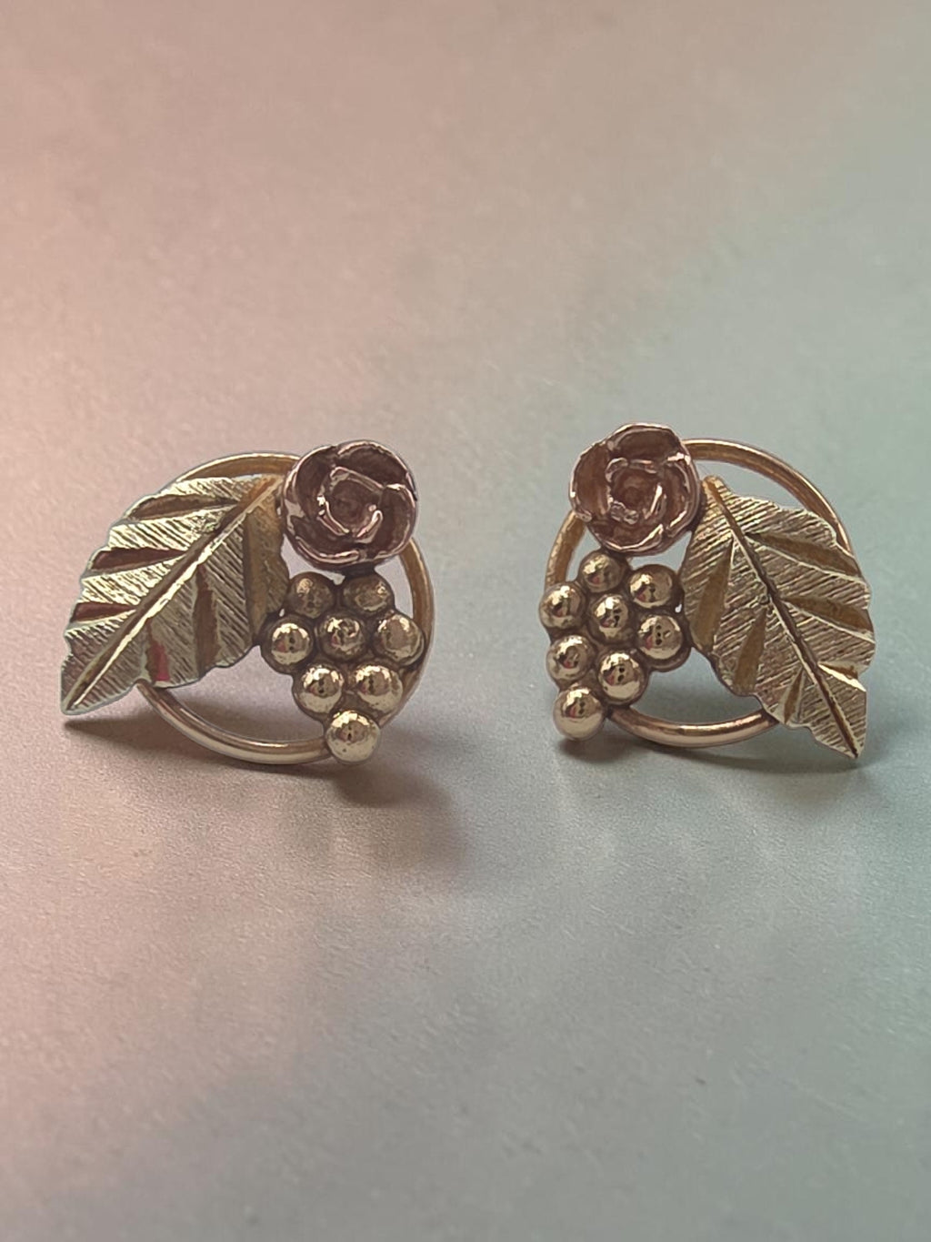 Black Hills Gold solid 10K tri color grape leaf and rose stud earrings marked CCO