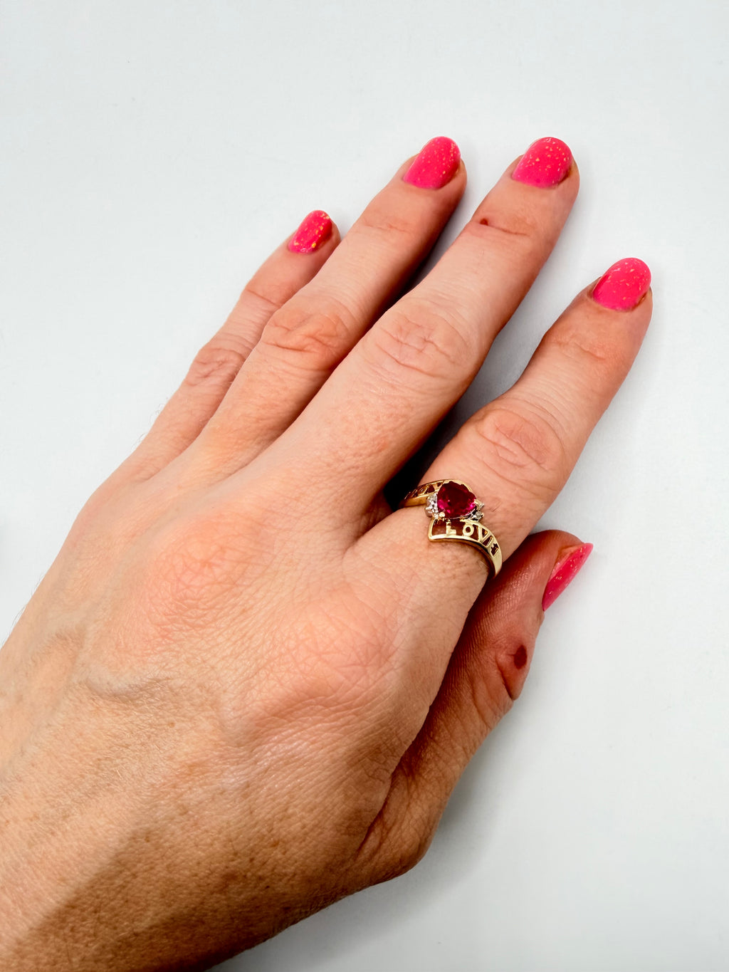 Solid 10K Yellow Gold Ring with Heart-Cut Ruby, Diamonds and LOVE – Size 7