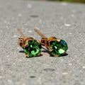 Solid 14K Yellow Gold Stud Earrings with Round Cut Green Gemstones