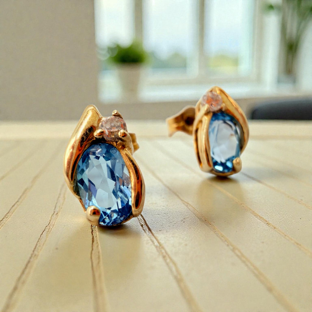 Solid 10K Yellow Gold Stud Earrings with Pear Cut Blue Topaz