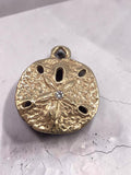 James Avery solid 14K yellow gold sand dollar charm with a custom set diamond in the center