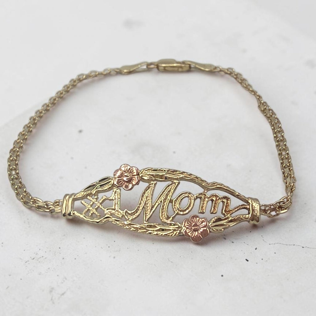 OroAmerica solid 10K gold #1 Mom bracelet with two tone floral accents and lobster claw clasp