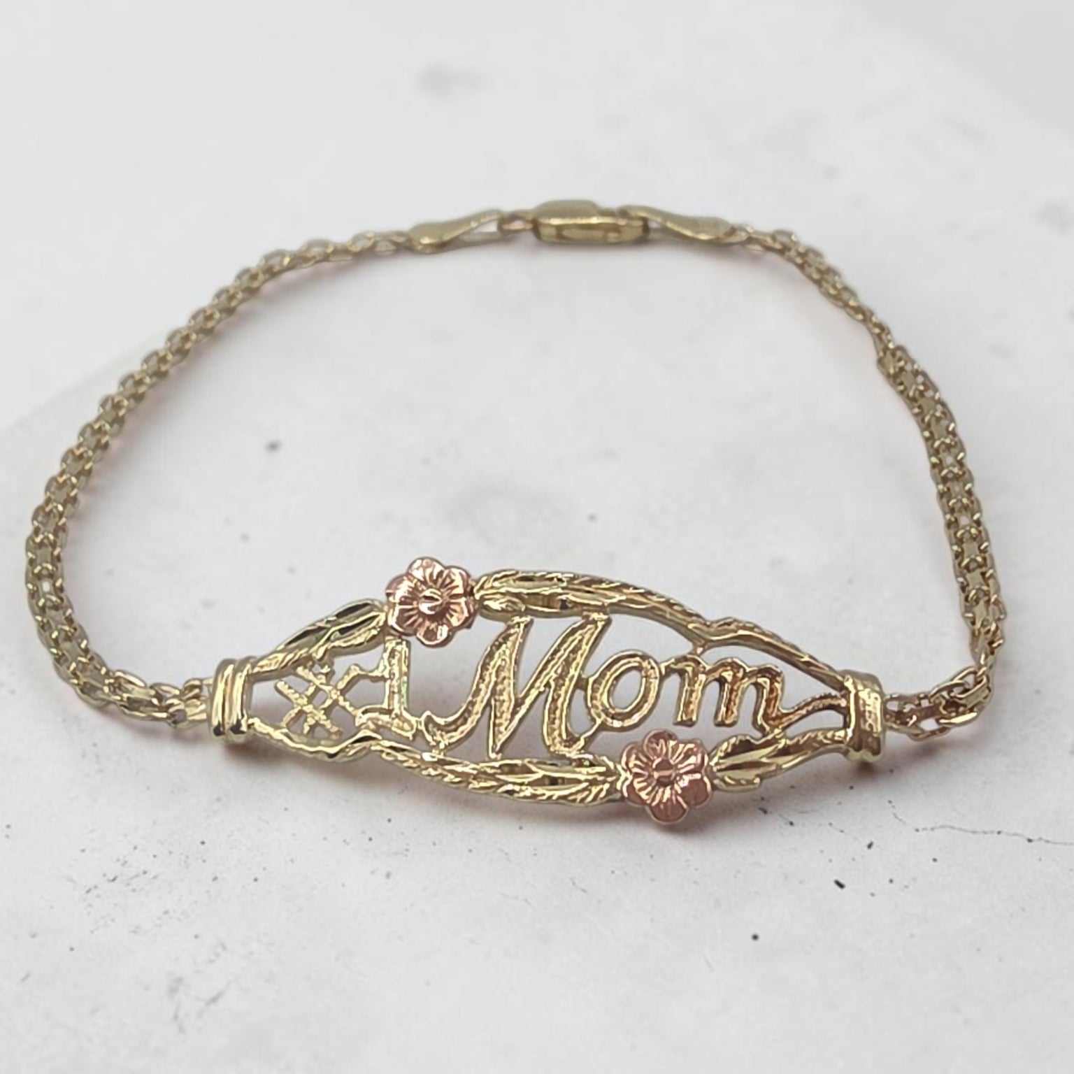 OroAmerica solid 10K gold #1 Mom bracelet with two tone floral accents and lobster claw clasp