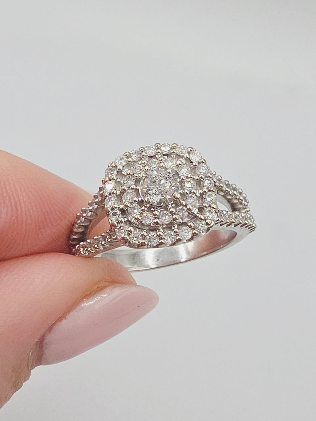 Pompeii3 solid 10K white gold diamond halo engagement ring with split shank band