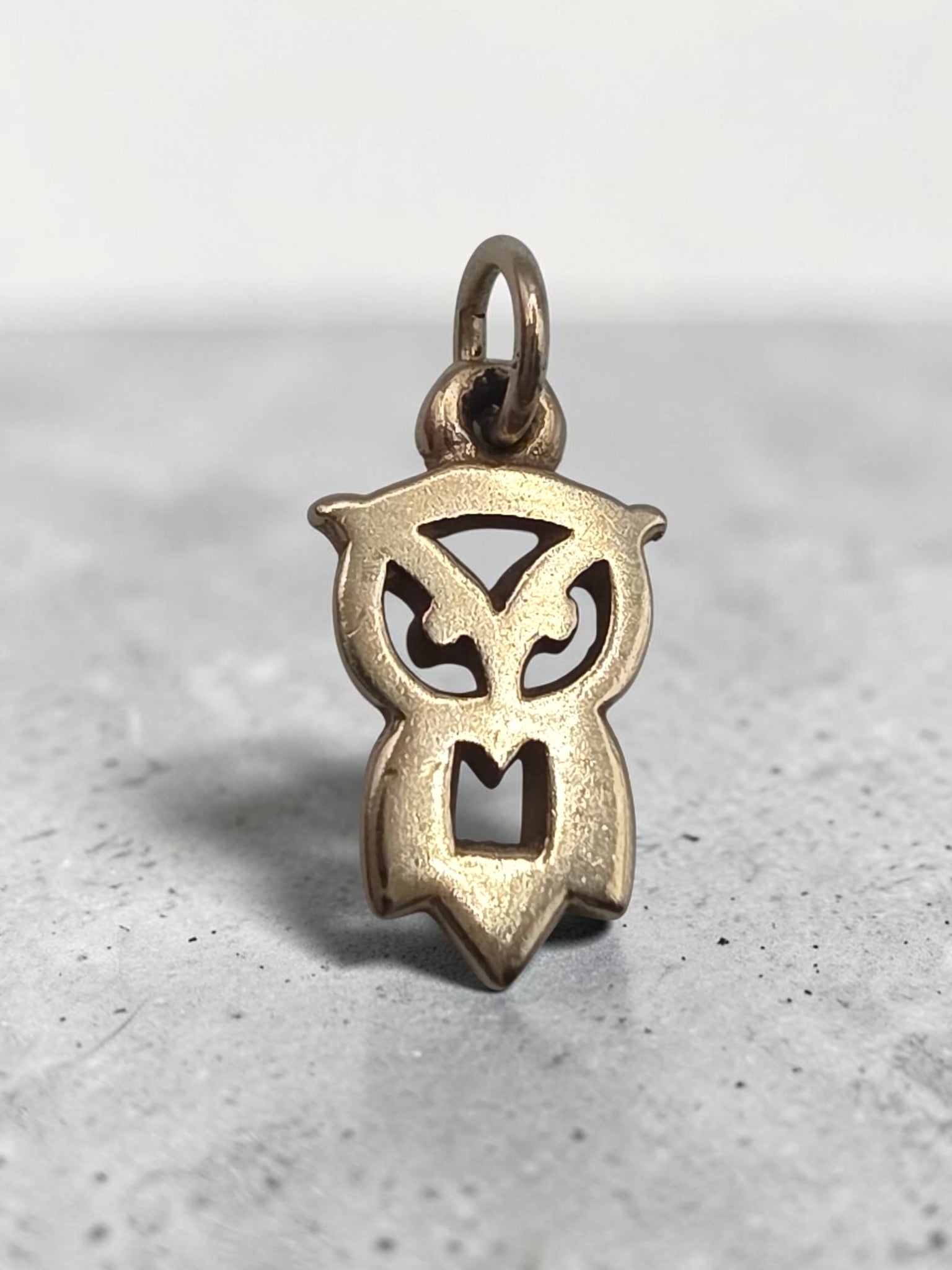 Retired James Avery solid 14K yellow gold flat owl charm with cutout eyes and body