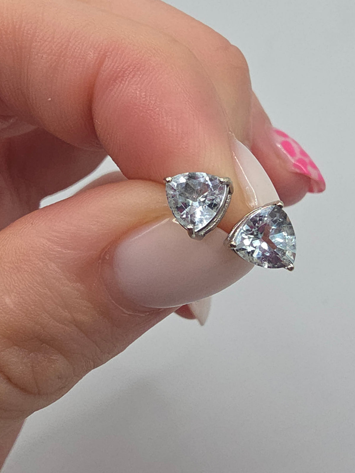 SGF Solid 10K White Gold Stud Earrings with Trillion Cut Blue Aquamarine in Open Three Prong Basket Settings