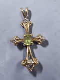 Solid 10K yellow gold oval peridot cross pendant with diamond accent