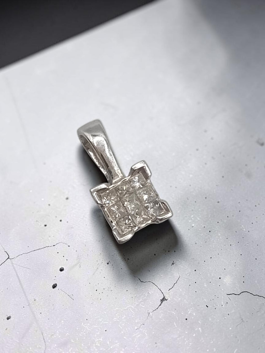 Solid 14K white gold diamond square cluster pendant marked WGD with nine square cut diamonds