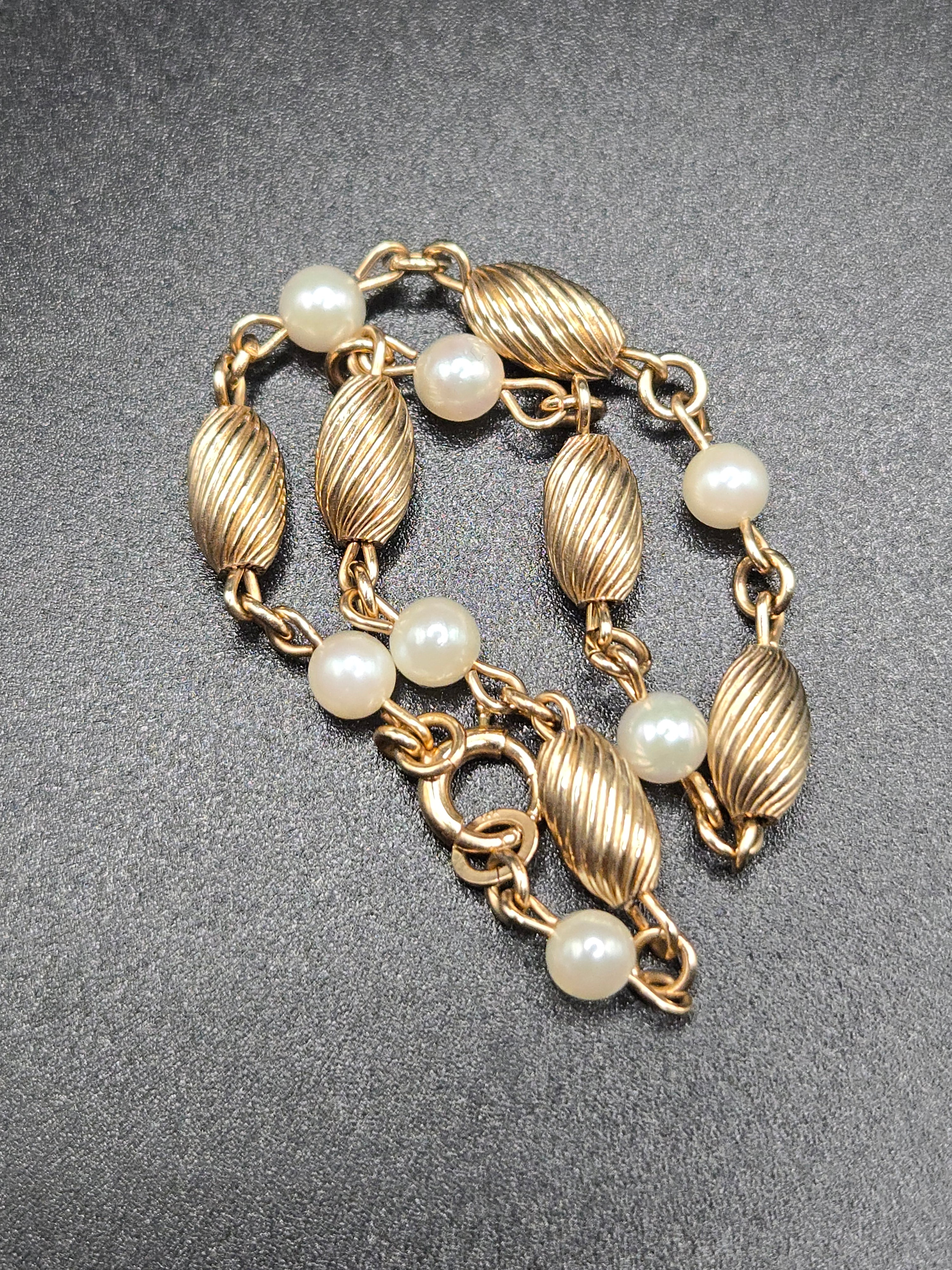 Solid 14K yellow gold A&Z bracelet with pearls and fluted oval gold beads, 7 inches
