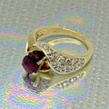 Solid 14K yellow gold oval ruby and pave diamond bypass ring size 6