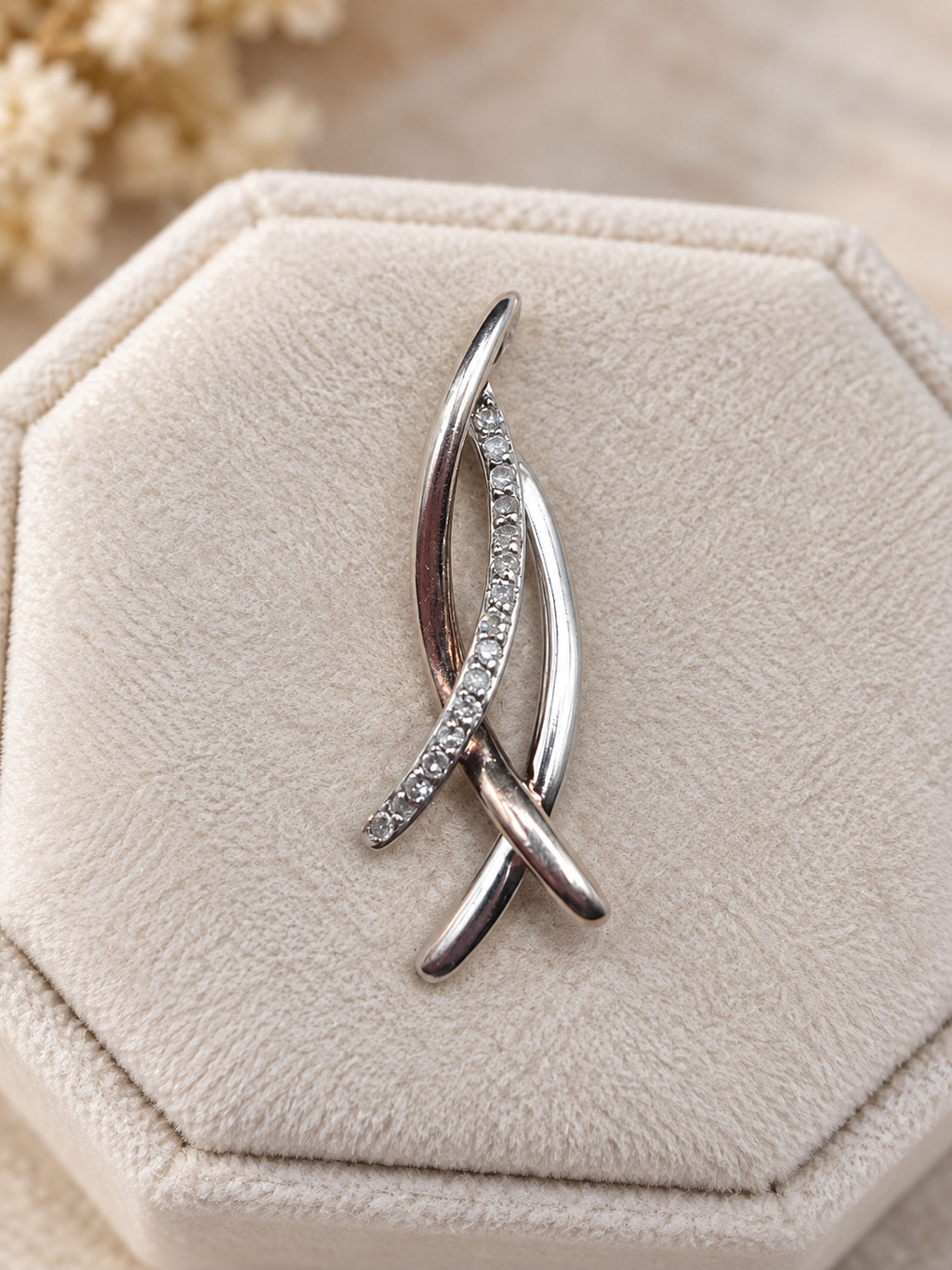 Sterling Silver Two Tone Pendant with 10K Rose Gold Plated Ribbon and Pave Diamond Crossover Design Marked M in a Circle