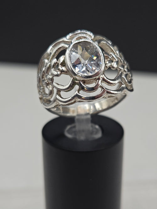 Sterling Silver Wide Band Ring with Oval Cubic Zirconia in Bezel Setting on Filigree Openwork Dome