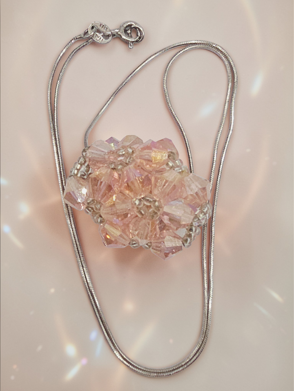 Sterling silver Italian snake chain necklace with pink faceted bead cluster pendant