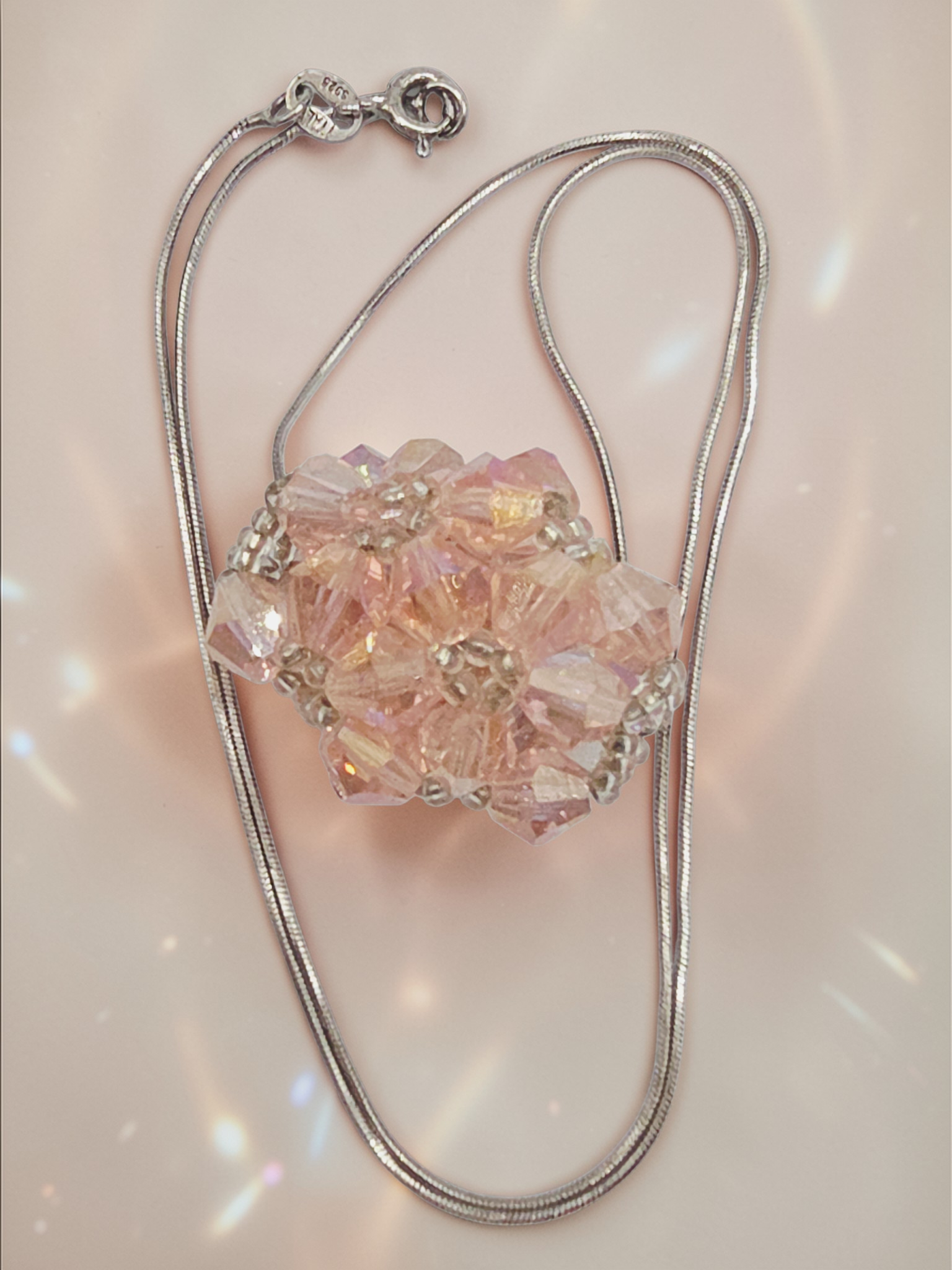 Sterling silver Italian snake chain necklace with pink faceted bead cluster pendant
