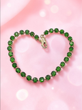 TH Solid 10K Yellow Gold Tennis Bracelet Set with a Continuous Line of Round Green Chrome Diopside in Four Prong Settings