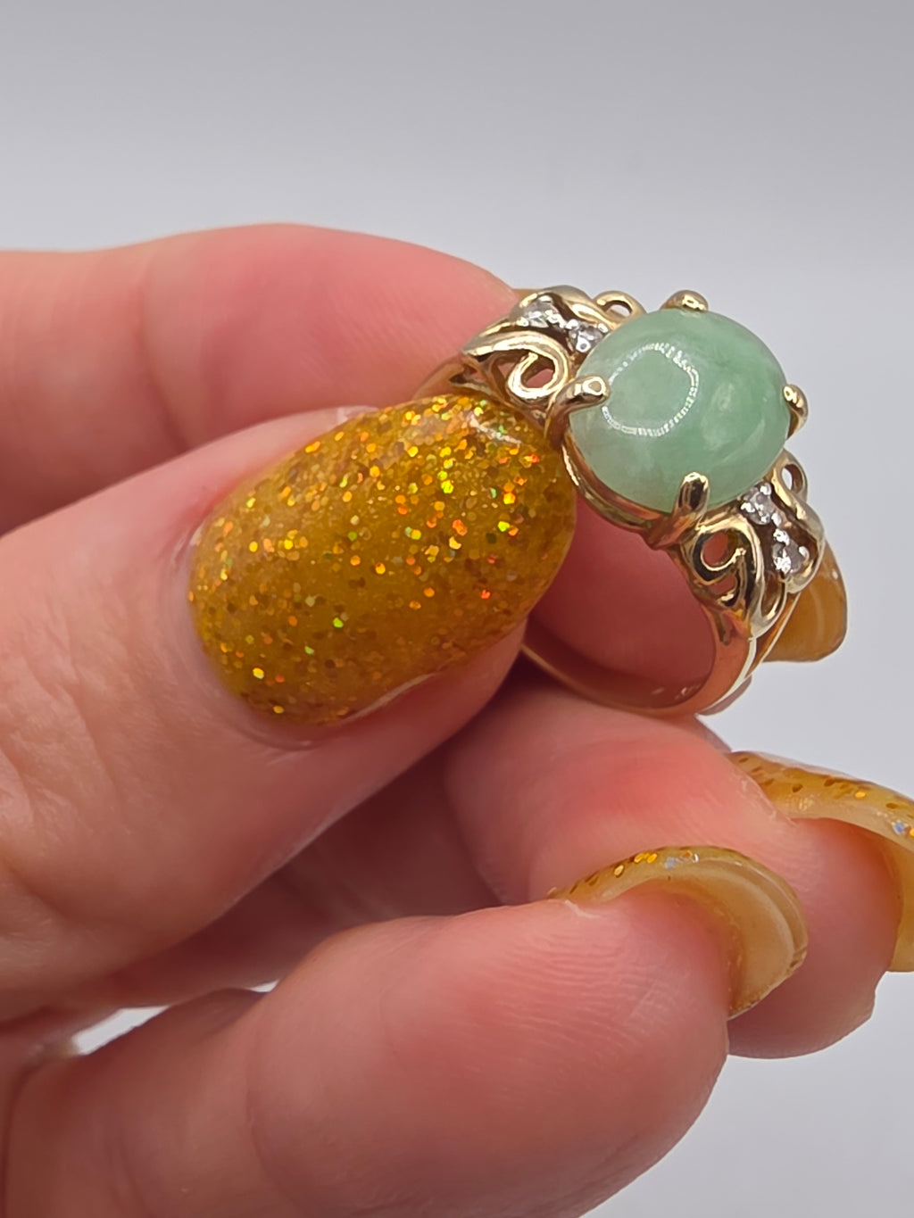 Vintage East Arts solid 14K yellow gold jade cabochon ring with diamond scrollwork shoulders