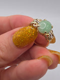 Vintage East Arts solid 14K yellow gold jade cabochon ring with diamond scrollwork shoulders