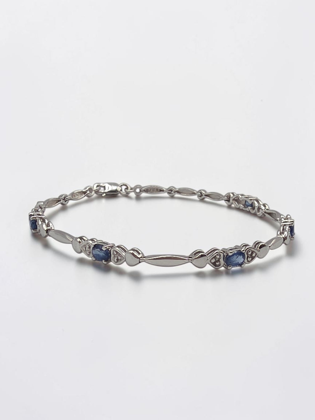 Vintage Sadye L Vassil solid 10K gold blue sapphire and diamond link bracelet with heart stations