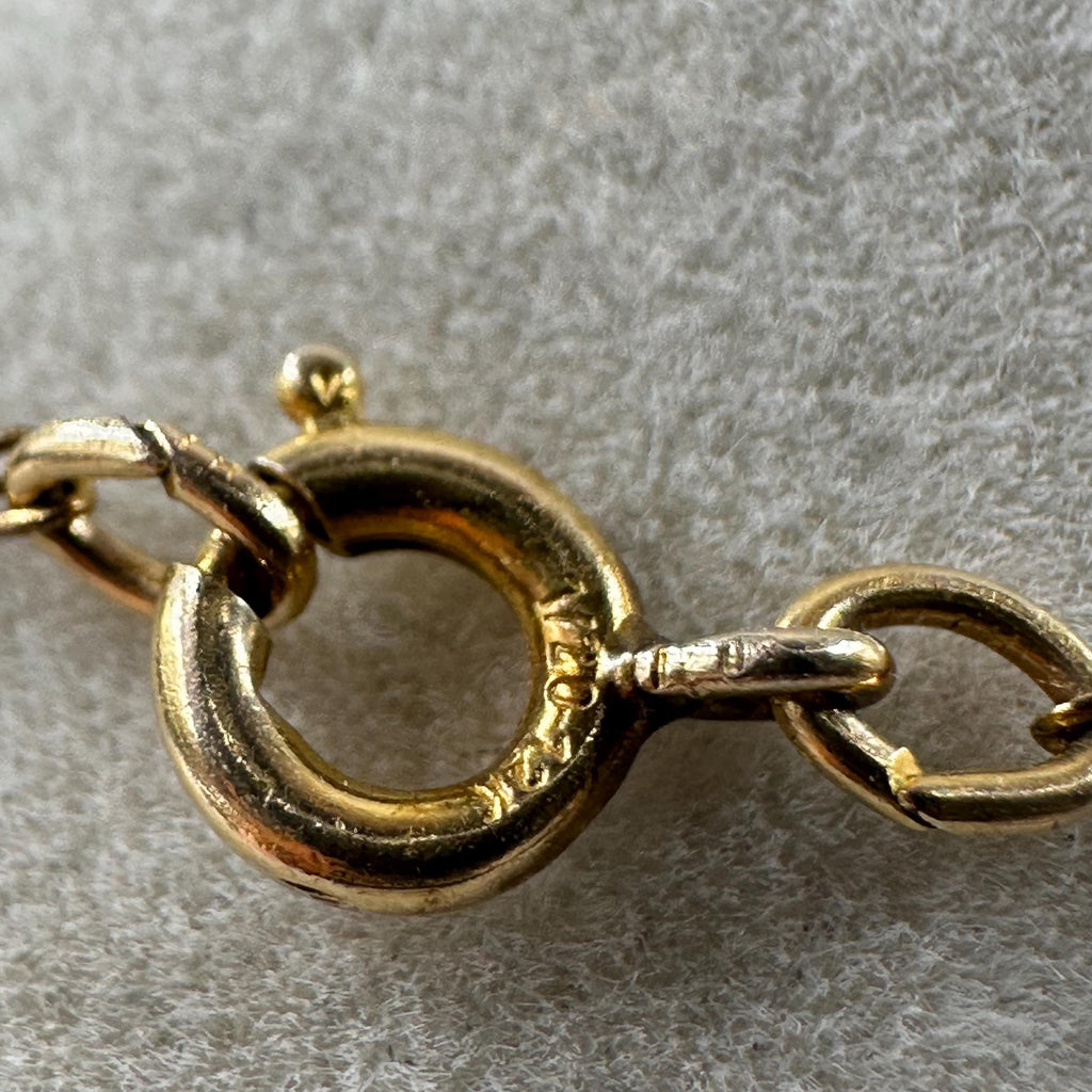 Black Hills Solid 10K Gold Pendant with Solid 12K Leaf Accents – 18 Inch Chain
