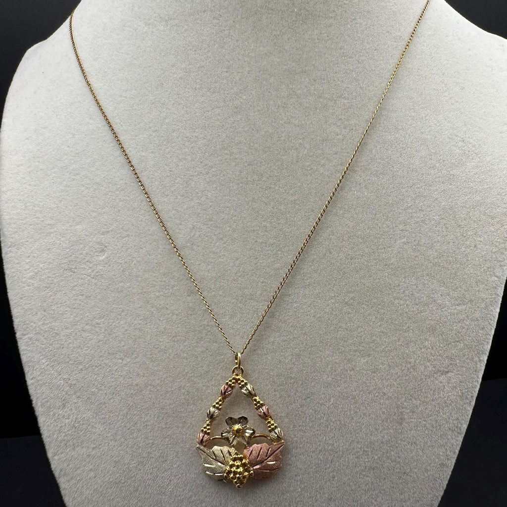 Black Hills Solid 10K Gold Pendant with Solid 12K Leaf Accents – 18 Inch Chain