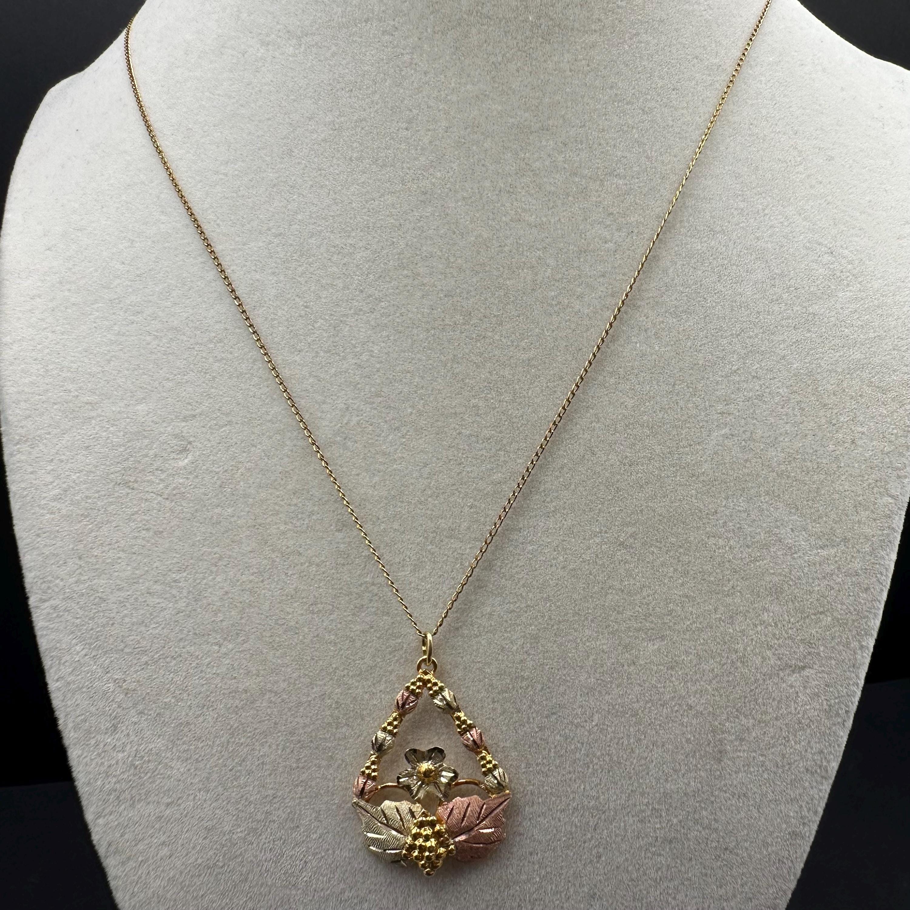 Black Hills Solid 10K Gold Pendant with Solid 12K Leaf Accents – 18 Inch Chain