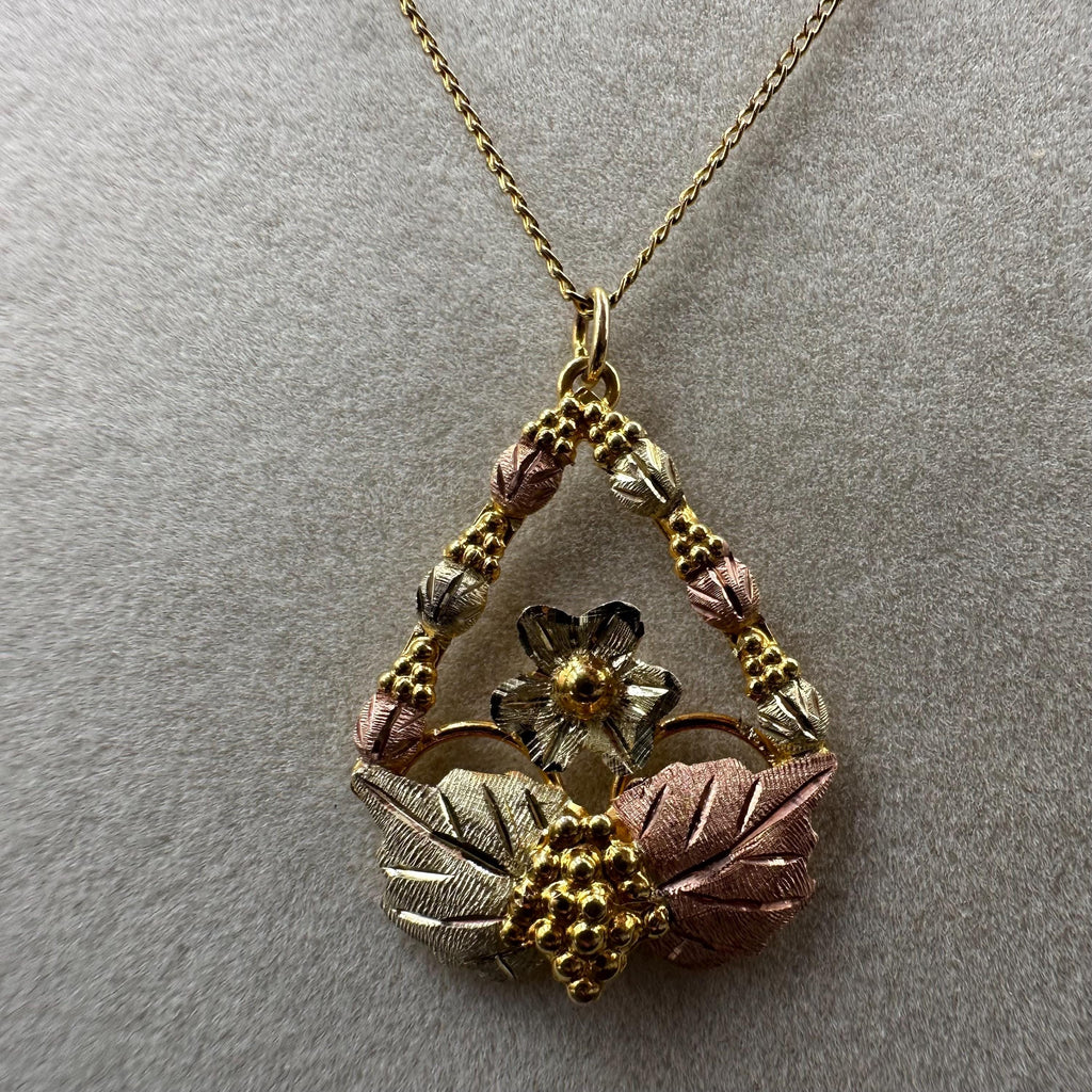 Black Hills Solid 10K Gold Pendant with Solid 12K Leaf Accents – 18 Inch Chain