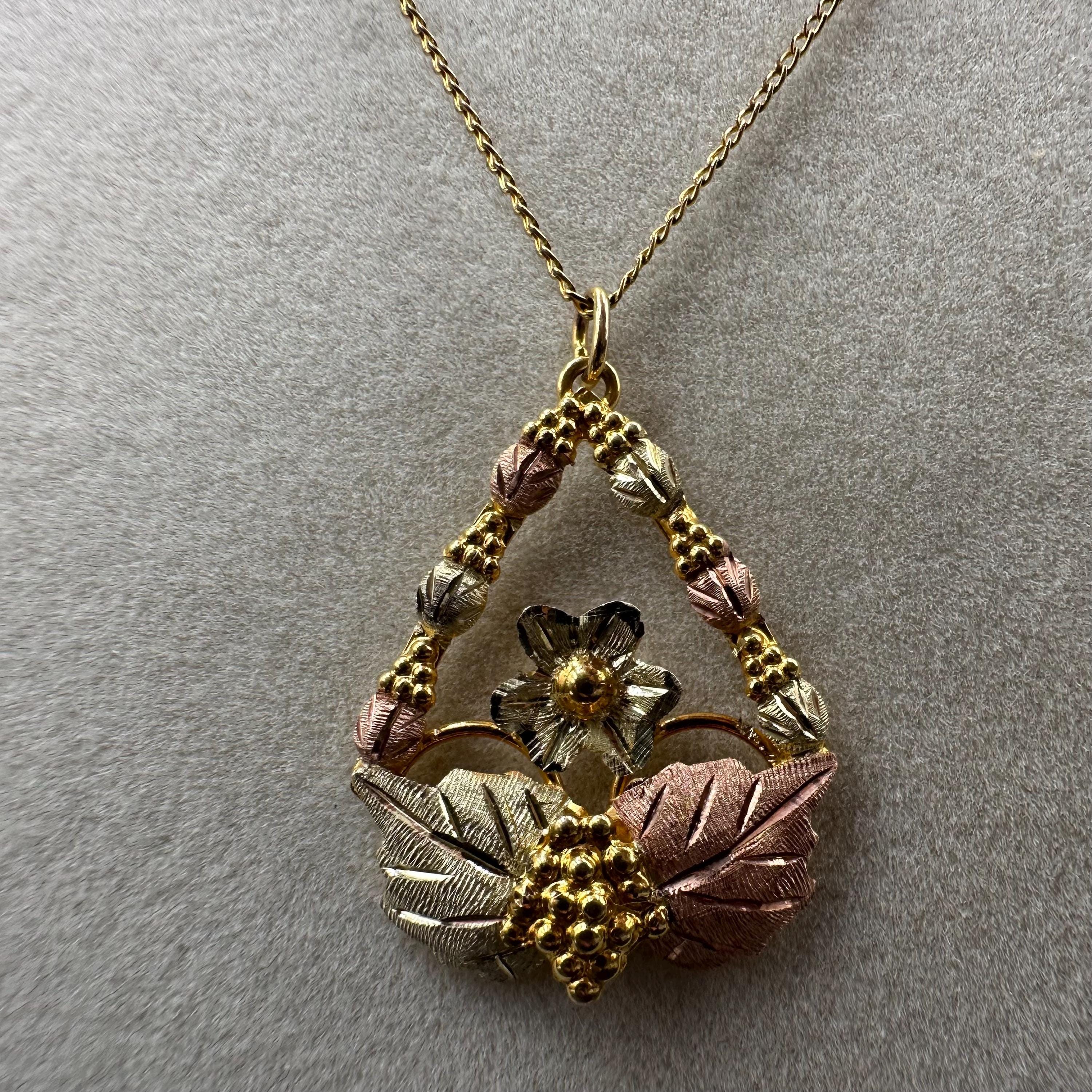Black Hills Solid 10K Gold Pendant with Solid 12K Leaf Accents – 18 Inch Chain