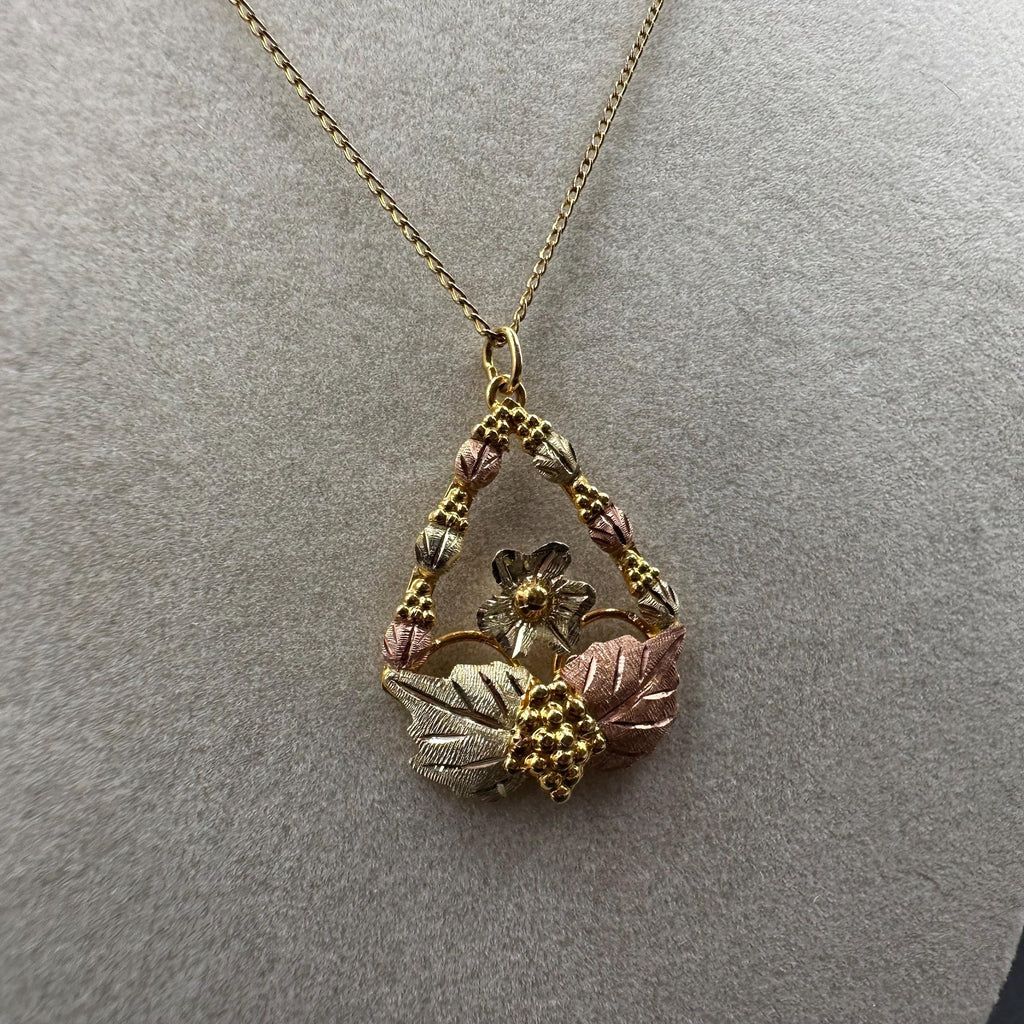 Black Hills Solid 10K Gold Pendant with Solid 12K Leaf Accents – 18 Inch Chain