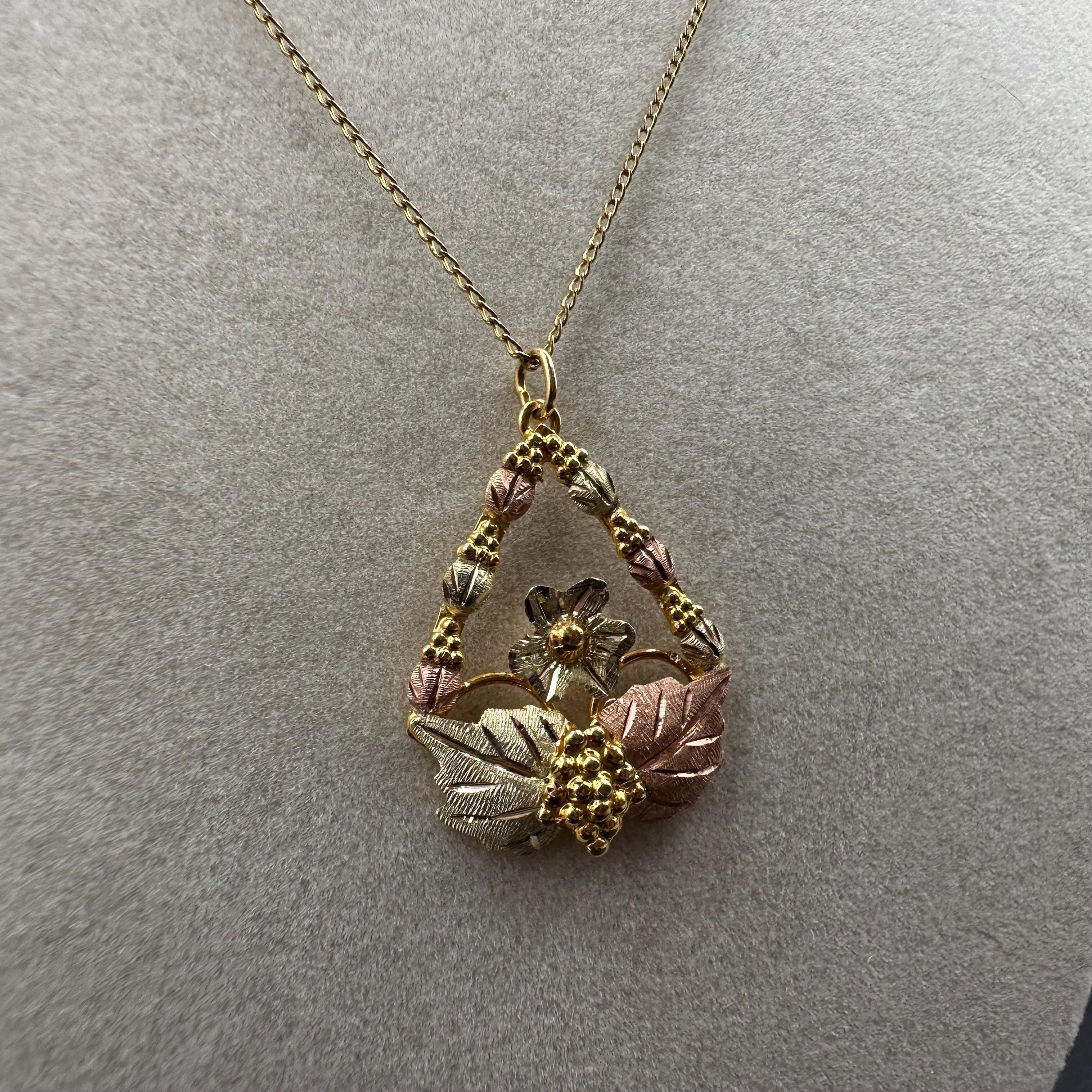 Black Hills Solid 10K Gold Pendant with Solid 12K Leaf Accents – 18 Inch Chain