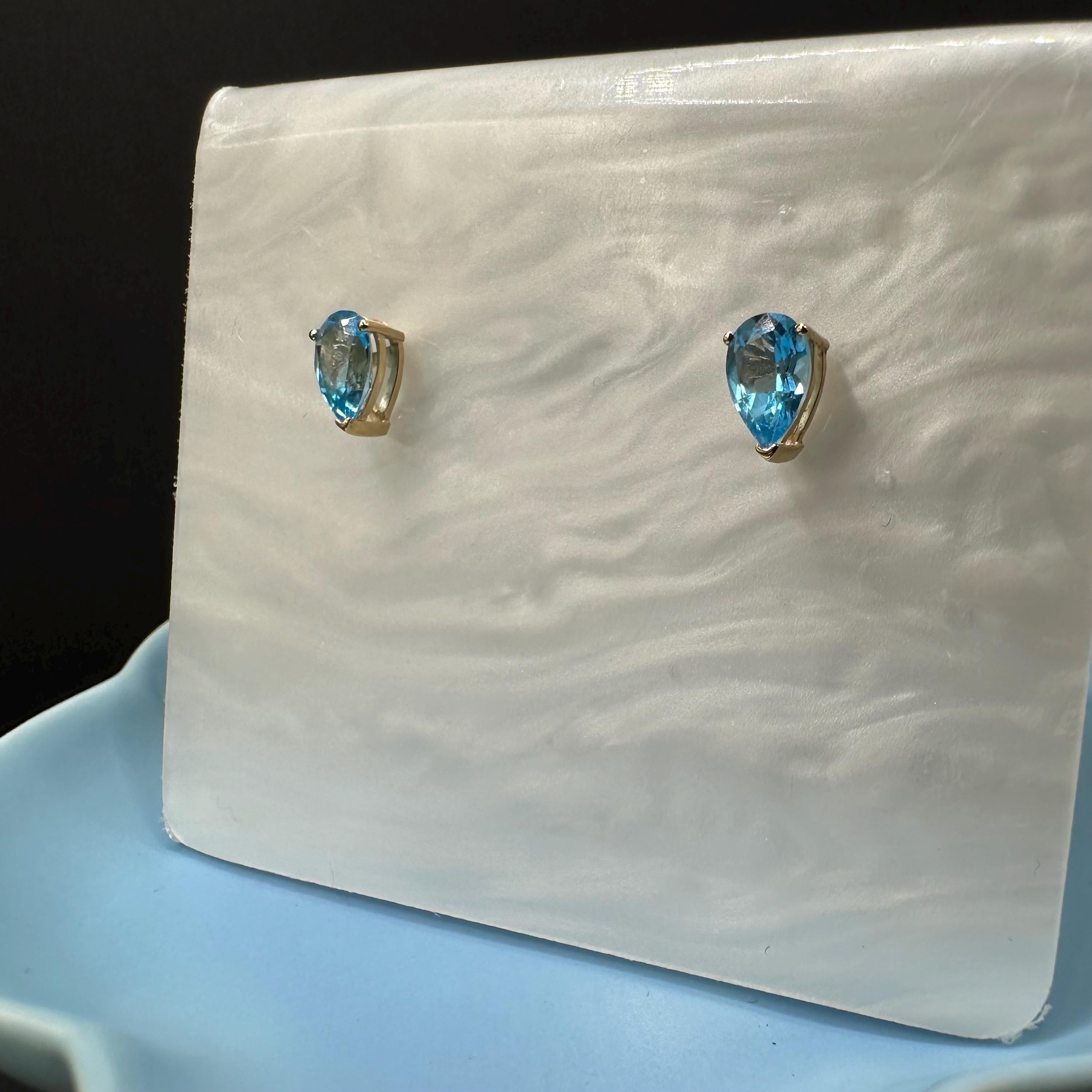 14K Solid Gold Pear Shape Blue Topaz Stud Earrings