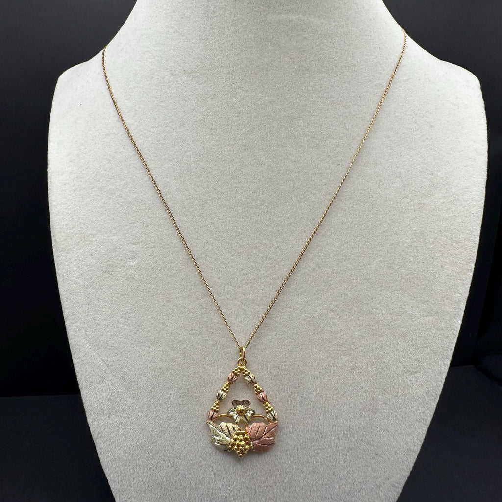 Black Hills Solid 10K Gold Pendant with Solid 12K Leaf Accents – 18 Inch Chain