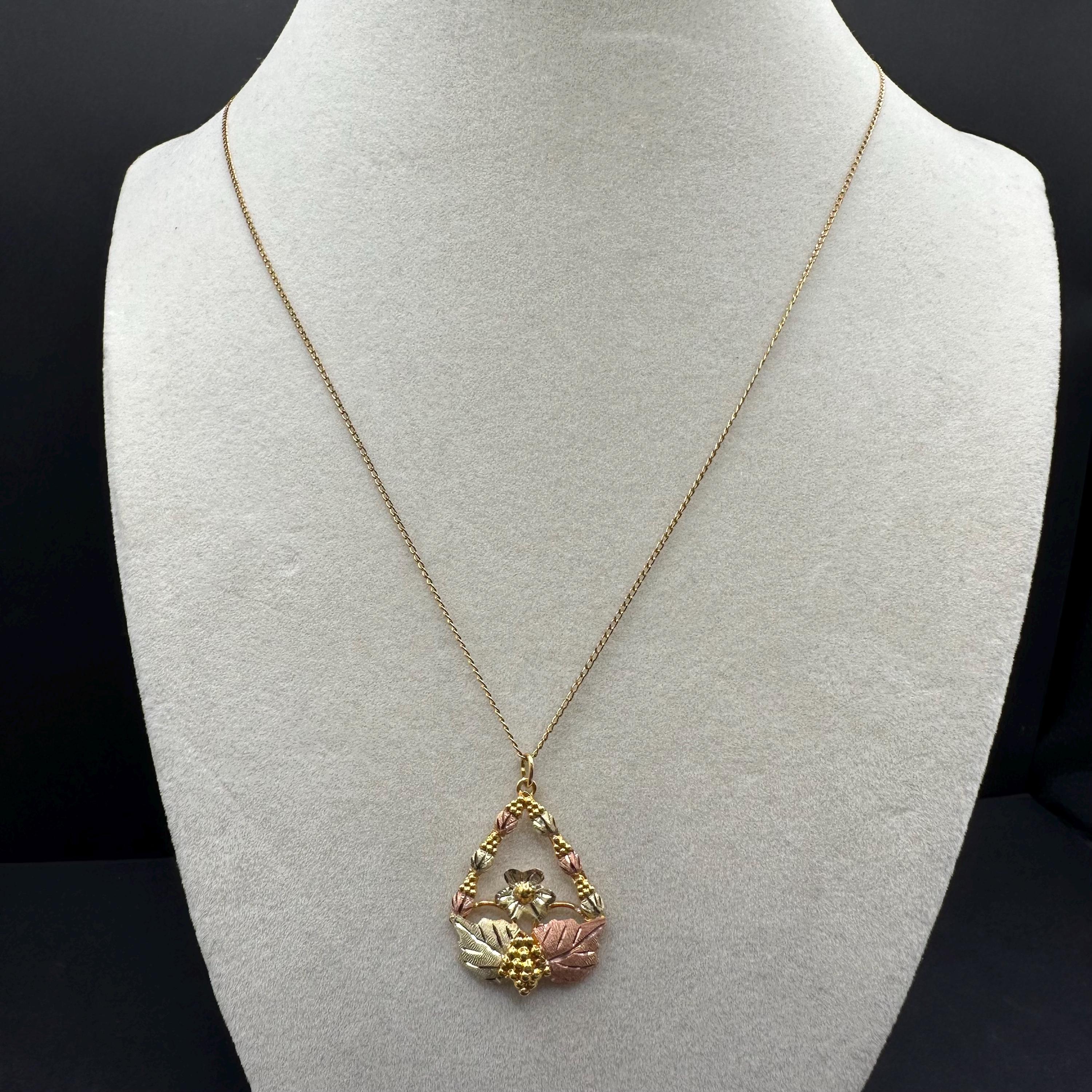 Black Hills Solid 10K Gold Pendant with Solid 12K Leaf Accents – 18 Inch Chain