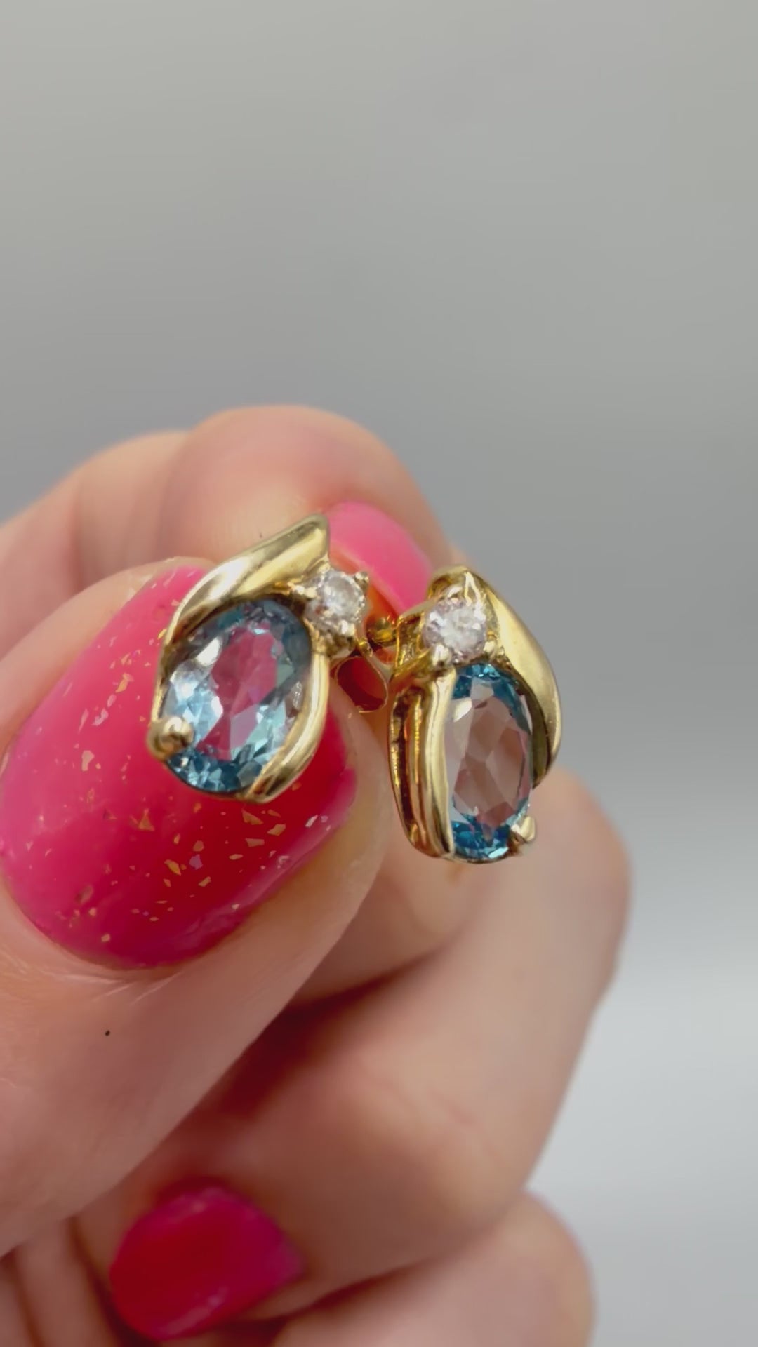 Solid 10K Yellow Gold Stud Earrings with Pear Cut Blue Topaz