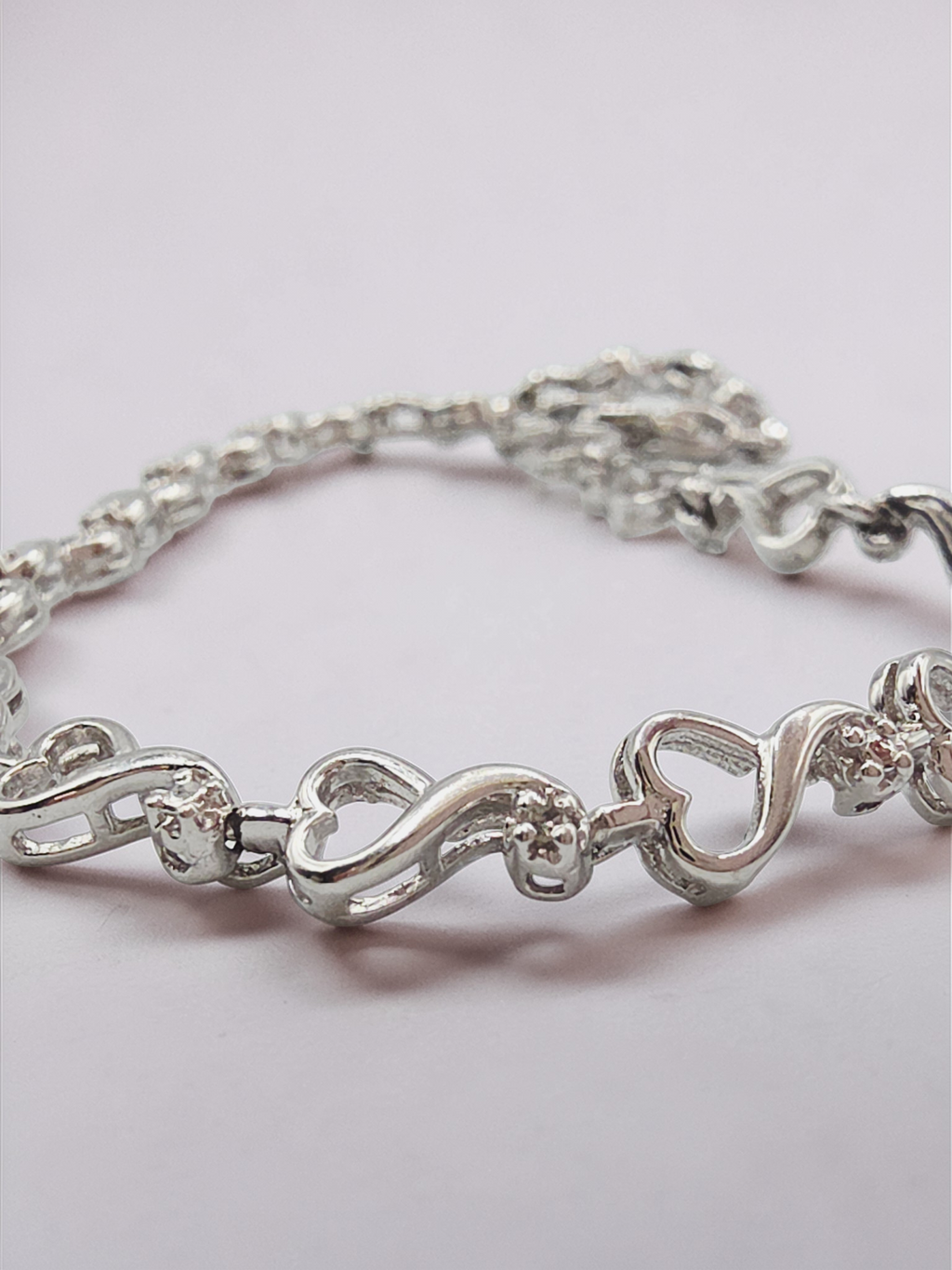 Solid 10K White Gold Heart Link Bracelet with Diamond Accents - 7.25 Inch