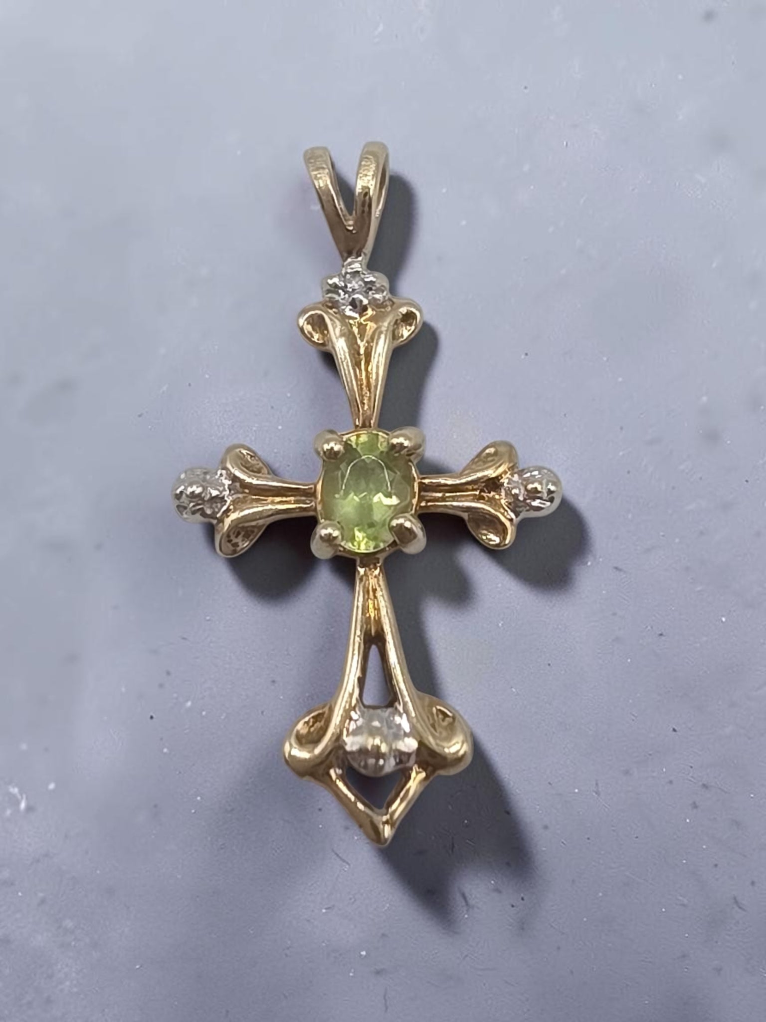 Solid 10K Yellow Gold Oval Peridot Cross Pendant with Diamond Accent