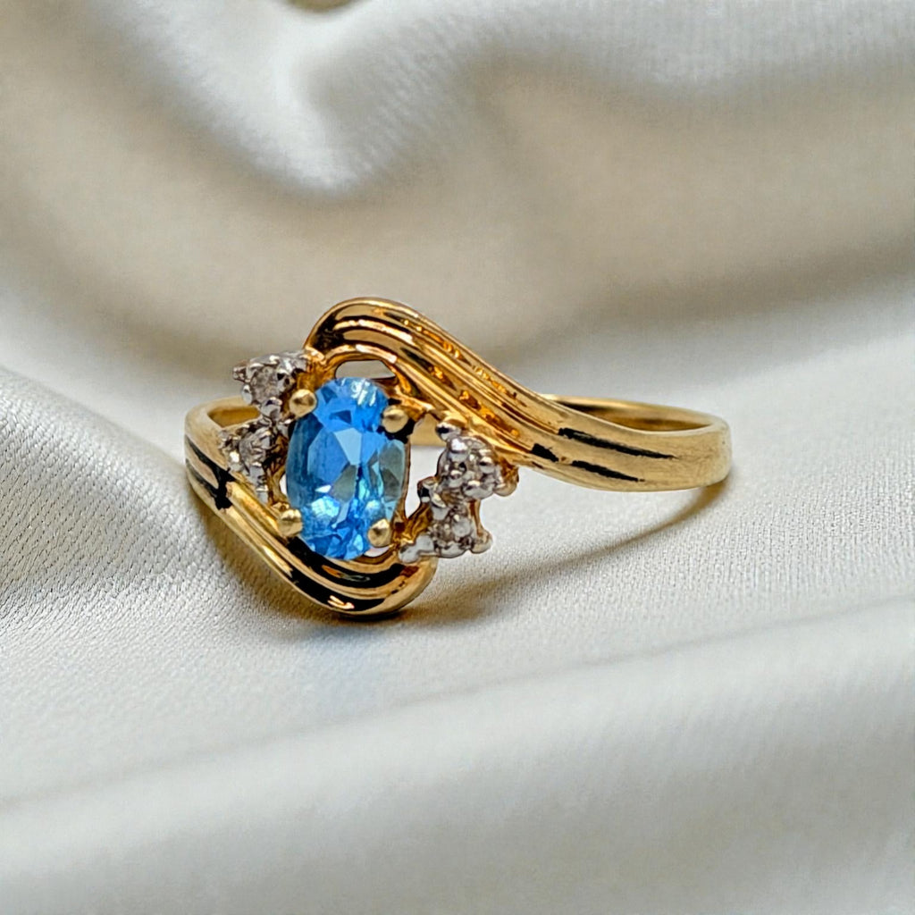 Solid 10K Yellow Gold Ring with Oval Cut Blue Topaz and Diamond Accents Size 7