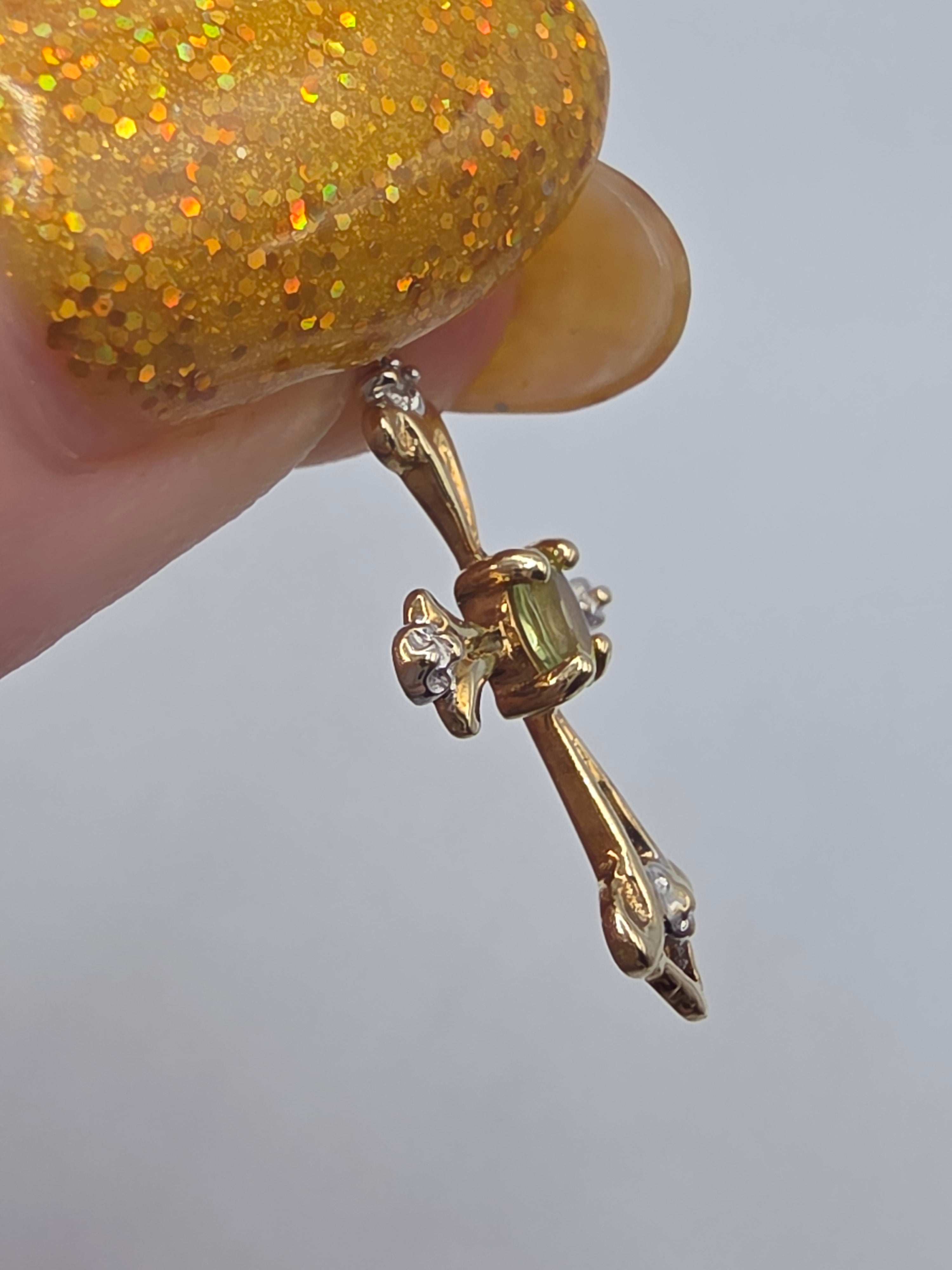 Solid 10K Yellow Gold Oval Peridot Cross Pendant with Diamond Accent
