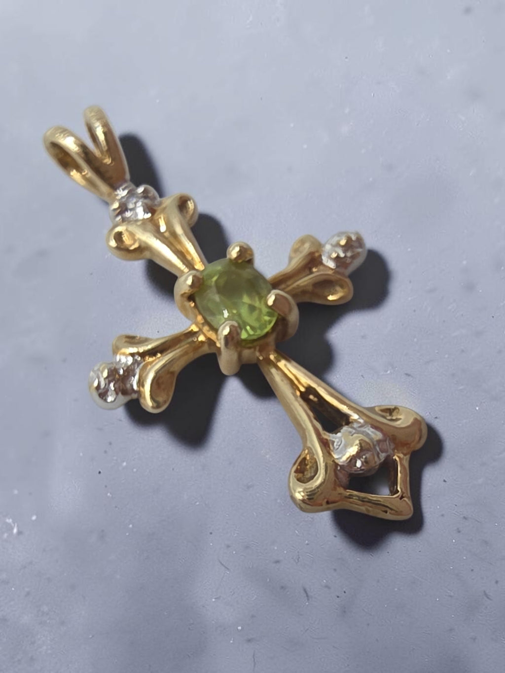 Solid 10K Yellow Gold Oval Peridot Cross Pendant with Diamond Accent