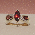 Solid 10K Gold Ring with Marquise-Cut Garnet and Diamond Accents – Size 6.75