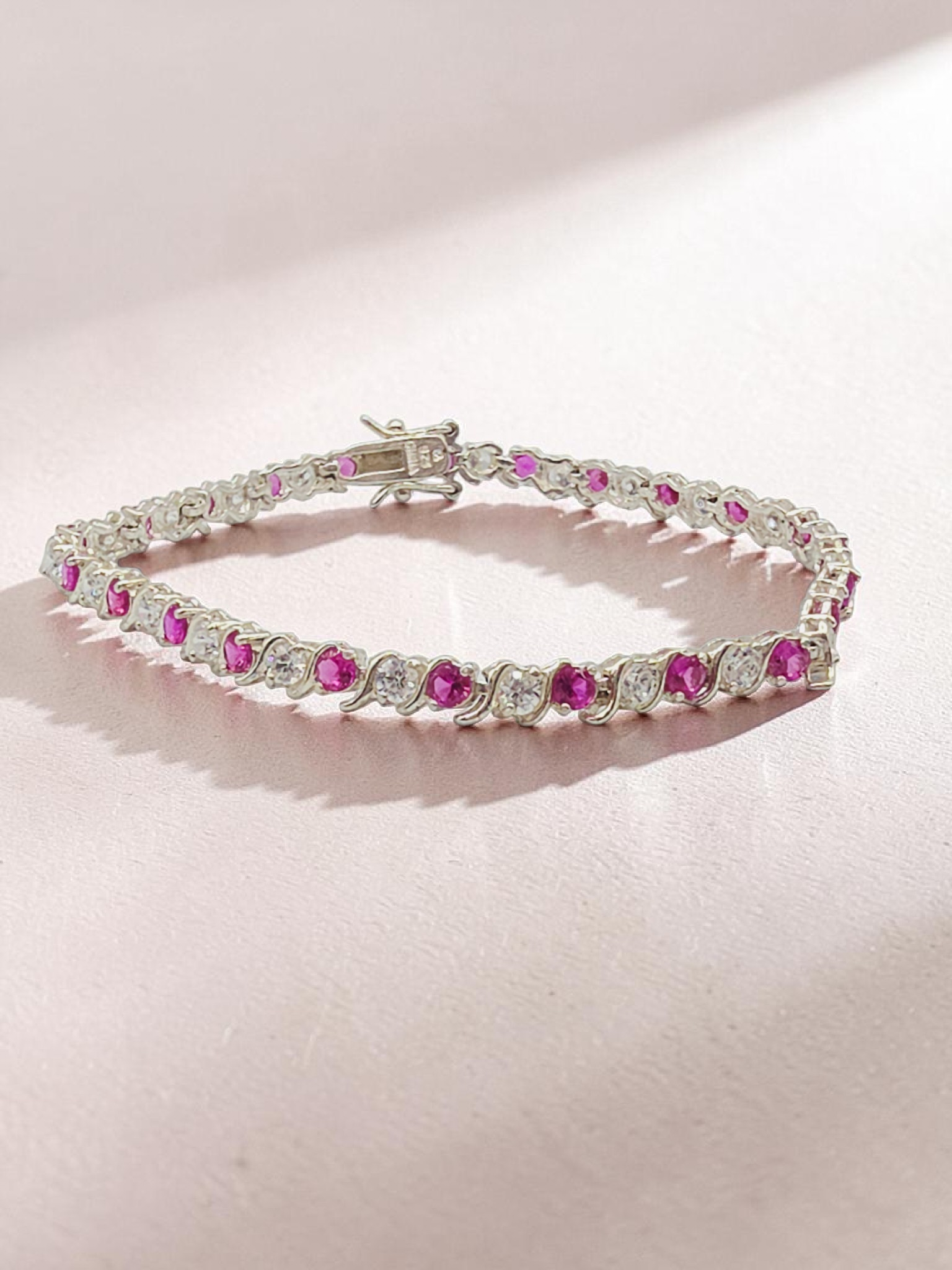 925 Sterling Silver Pink Sapphire Tennis Bracelet with CZ Accents - 7.5 Inch