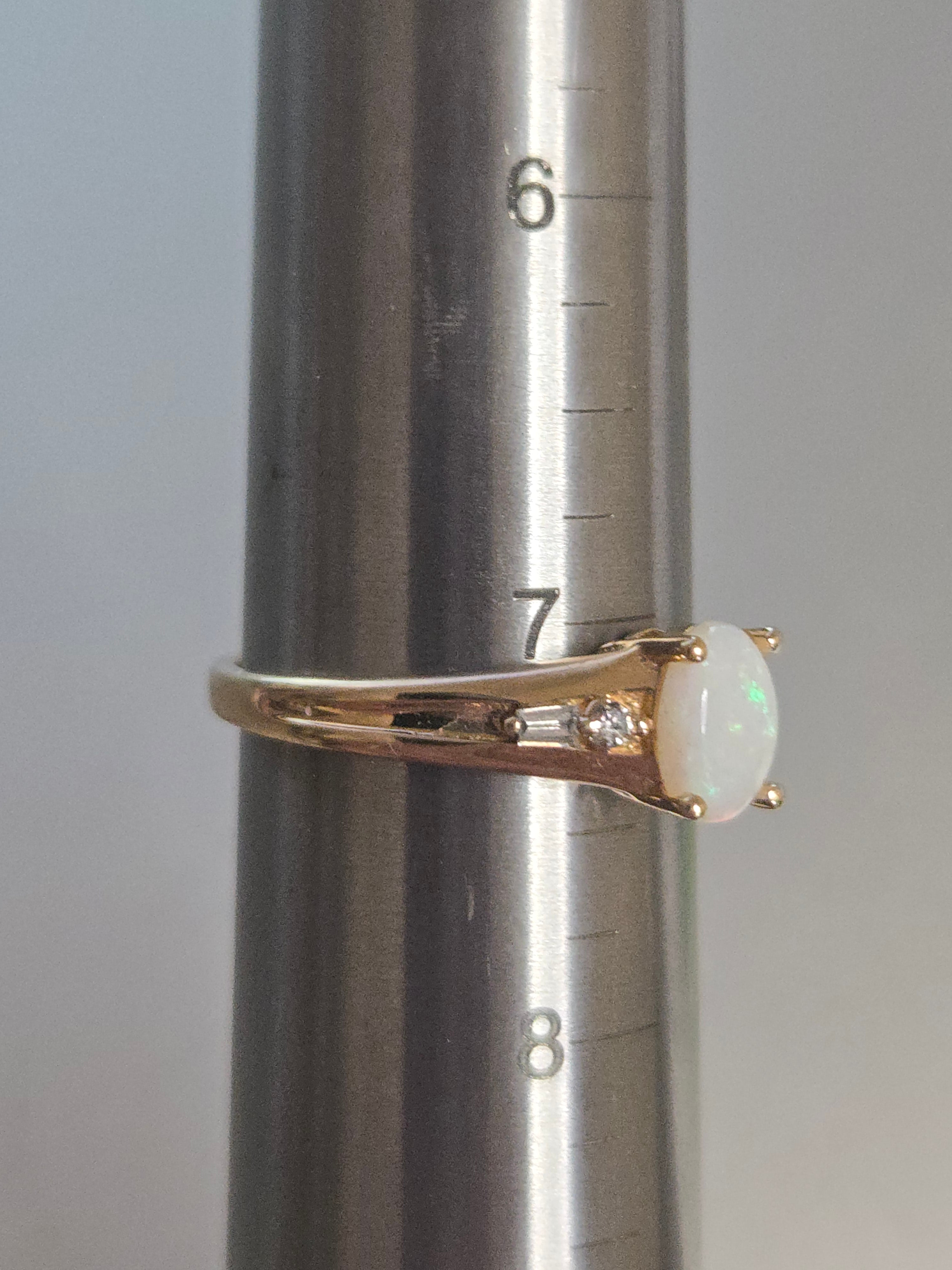 Solid 14K Yellow Gold Ring with Oval-Cut Opal and Diamond Accents - Size 7.25